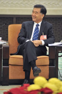 Wang Yang, newly appointed Chinas vice premier, attends a group discussion meeting as part of the 18th Communist Party Congress at the Great Hall of the People in Beijing, China, 9 November 2012 clipart