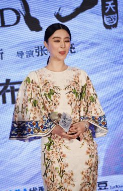 Chinese actress Fan Bingbing makes naughty faces during a press conference for her new movie, The White Haired Witch of Lunar Kingdom, in Beijing, China, 27 March 2014. clipart
