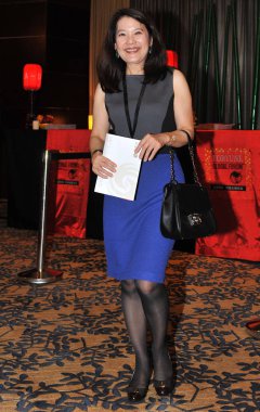 Julia S. Gouw, President and CEO of East West Bancorp, Inc, arrives at Shangri-la Hotel Chengdu ahead of the 12th Fortune Global Forum in Chengdu city, southwest Chinas Sichuan province, 5 June 2013 clipart
