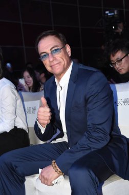 U.S. Hollywood action star Jean-Claude Van Damme poses during a press conference for the movie 