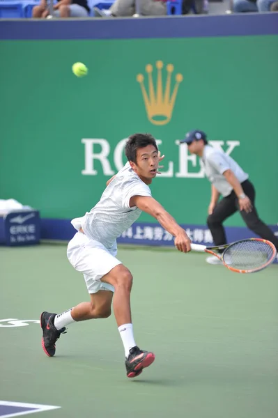 中国の王 Chuhan 2014 上海マスターズ テニス大会で 上海で 2014 男子シングルス 回戦でイタリアのファビオ Fognini — ストック写真