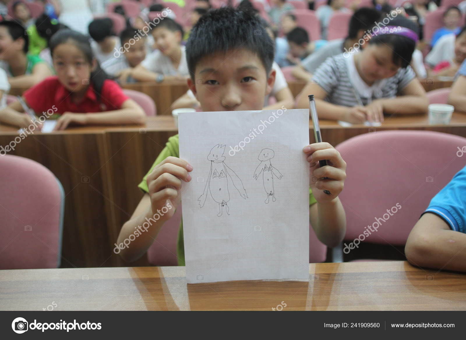 Young Chinese Student Displays His Drawing Showing Naked Boy Naked