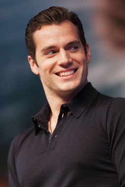 British actor Henry Cavill smiles at a press conference of the new movie, Man of Steel, during the 16th Shanghai International Film Festival in Shanghai, China, 20 June 2013. clipart
