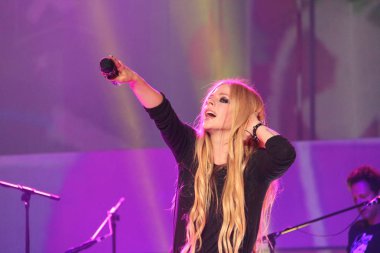 Canadian singer Avril Lavigne performs during her concert in Guangzhou, southeast Chinas Guangdong province, 3 August 2013.
