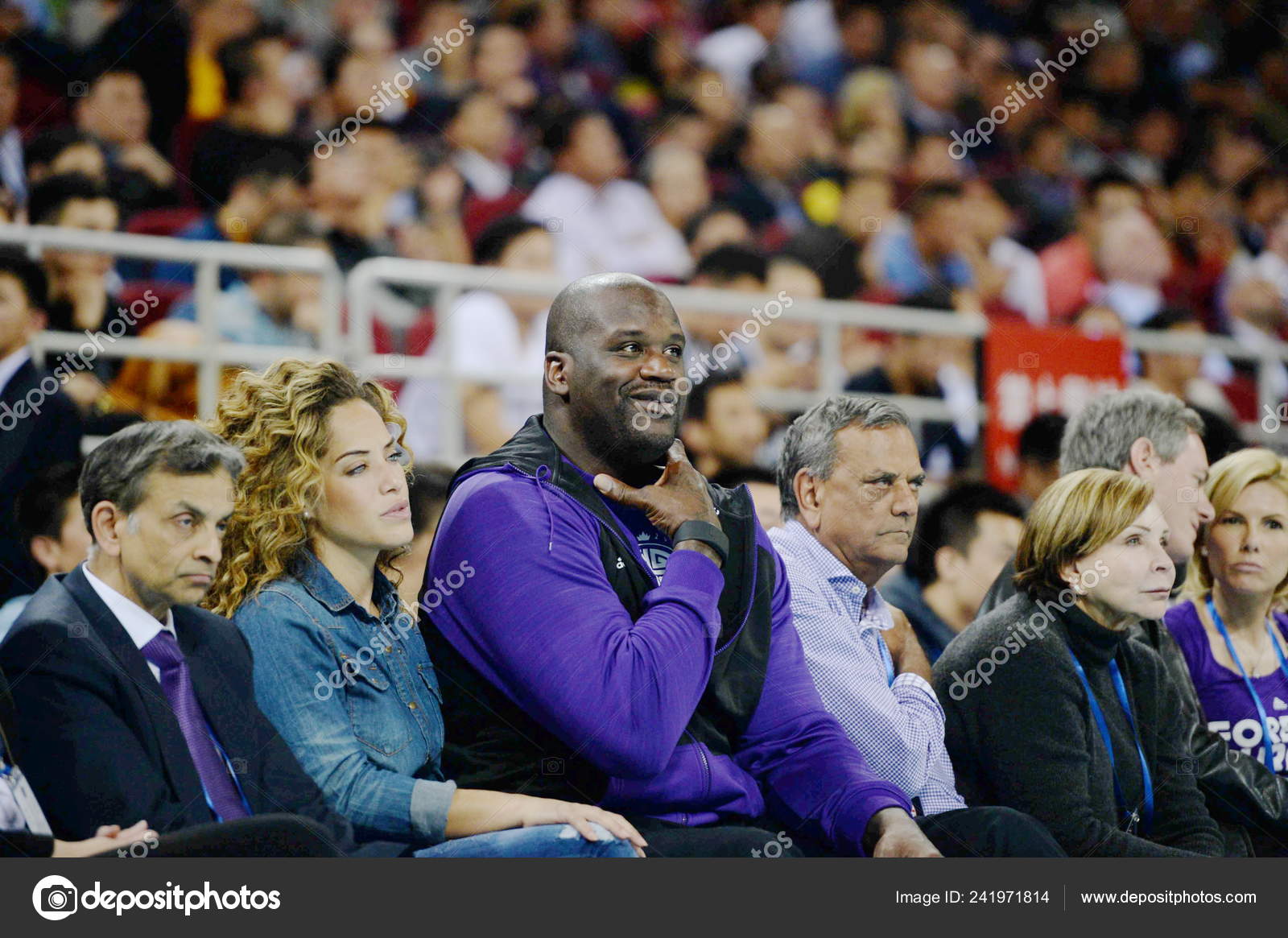 Retired NBA star Shaquille O'Neal prepares to throw balls to spectators as  gifts before an NBA exhibition game between Sacramento Kings and Brooklyn N  Stock Photo - Alamy