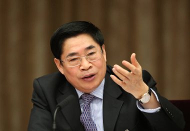 Yuan Chunqing, then Communist Party secretary of Shanxi province,  speaks at a session of National Peoples Congress (NPC) in Beijing, China, 6 March 2014. clipart