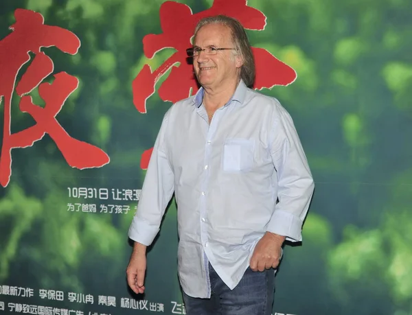 ファイル フランスの監督フィリップ ムイルは 2014年10月20日 中国の北京で フランスと中国の共同制作映画 ナイチンゲール の記者会見で笑顔を見せた — ストック写真