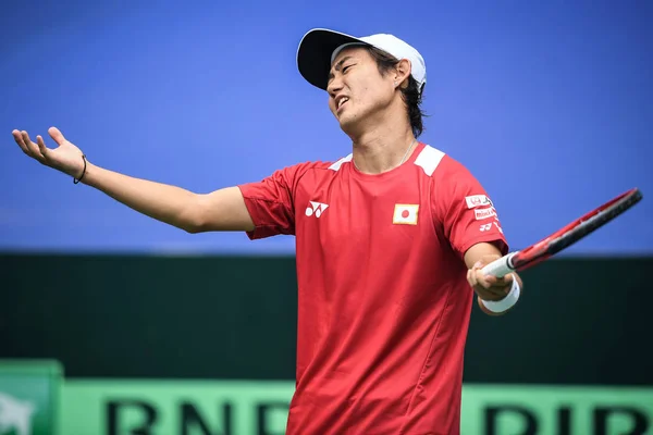 Yoshihito Nishioka Van Japan Reageert Terwijl Concurreren Tegen Zhe Van Stockfoto