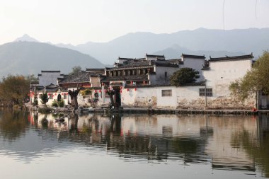 View of traditional buildings in Hongcun village, which has been listed as world cultural heritage site, in Yixian county, Huangshan city, east Chinas Anhui province, 22 November 2013 clipart