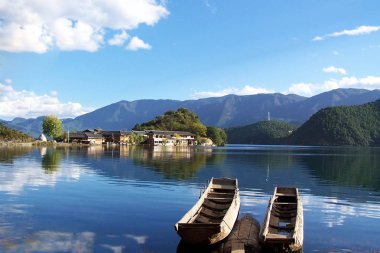 Natural scenery of the Lugu Lake which is situated in the mountains bordering southwest Chinas Sichuan and Yunnan provinces, 23 October 2007. clipart