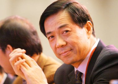 Bo Xilai, then Governor of Liaoning province and son of former Chinese Vice Premier Bo Yibo, attends the China Entrepreneur Summit 2003 in Beijing, China, 6 December 2003 clipart