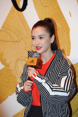 Hong Kong actress Angelababy attends a promotional event for Adidas in Shanghai, China, 11 January 2019. clipart