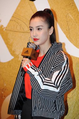 Hong Kong actress Angelababy attends a promotional event for Adidas in Shanghai, China, 11 January 2019. clipart