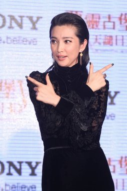 Chinese actress Li Bingbing poses as she attends the movie premiere of, Resident Evil: Retribution, in Taipei, Taiwan, 10 September 2012. clipart