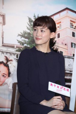Japanese actress Haruka Ayase smiles during the press conference for her new movie, Hotaru no Hikari, in Taipei, Taiwan, 9 June 2012. clipart