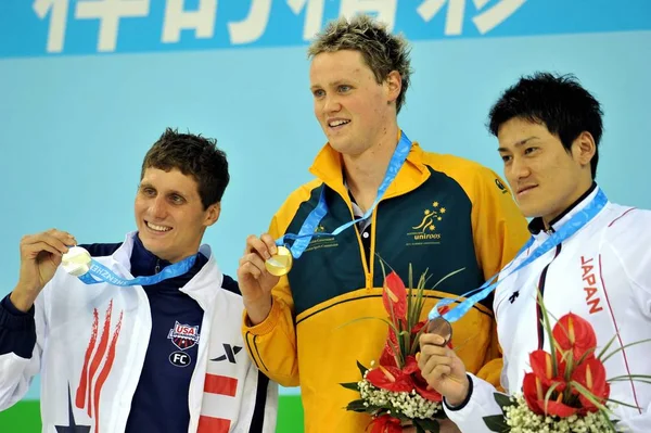 Guldmedaljevinder Mckeon David Australia Sølvmedaljevinder Michael Bronzemedaljevinder Uchida Sho Japan - Stock-foto