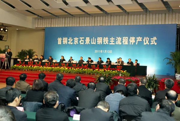 Chinese officials, company executives and guests attend a shutdown ceremony for the Shijingshan steel plant of Shougang Group in Beijing, China, 13 January 2011