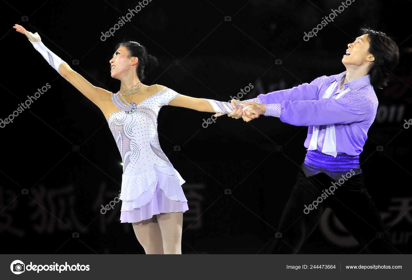 Chinese Ice Skating Duo Pang Qing Left Tong Jian Perform Stock