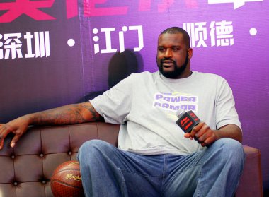 Former NBA superstar Shaquille ONeal attends a promotional event by Chinese sportswear brand Li-Ning during his China tour in Nanning city, south Chinas Guangxi Zhuang Autonomous Region, 19 October 2011. clipart