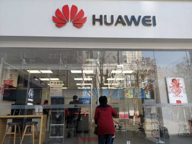 View of a Huawei store in Wuhan city, central China's Hubei province, 23 January 2019.    clipart