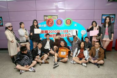 Young Chinese climate activists who stripped down to their pants and boxers pose at a subway station during a campaign to promote environmental protection and low-carbon lifesyle in Guangzhou city, south Chinas Guangdong province, 17 January 2010 clipart