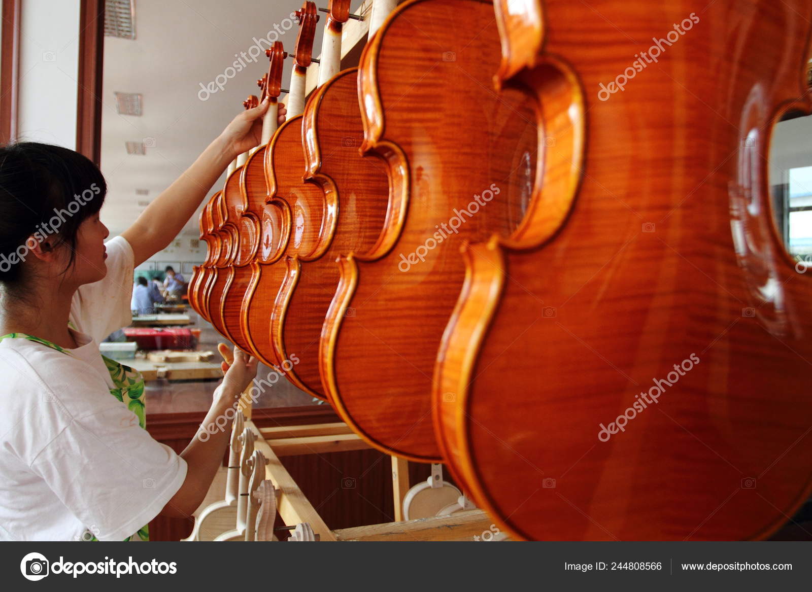 Chinese Worker Hangs Newly Made Violins Factory Beijing Huadong Musical