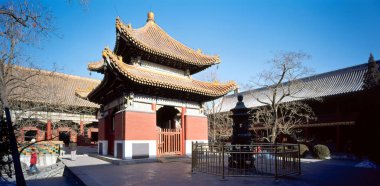 View of the Yonghe Gong (the Yonghegong, the Palace of Eternal Harmony or the Yonghe Gong Lamasery) in Beijing, China. clipart