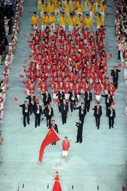 The Chinese delegation attends the opening ceremony of the 16th Asian Games in Guangzhou city, south Chinas Guangdong province, 12 November 2010 clipart