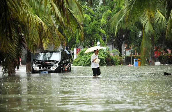 Chinese Man Walks Flooded Street Heavy Rain Sanya City South — Stock Photo, Image
