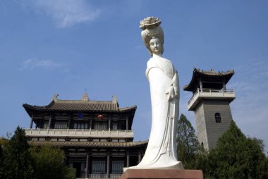 The statue of Yang Yuhuan, known as Yang Guifei, the imperial concubine of Emporer Xuanzong (Li Longji) of Tang Dynasty, is displayed in the Tombe of the Concubine Yang in Mawei town, Xingping city, northwest Chinas Shaanxi province, 24 October 2009. clipart
