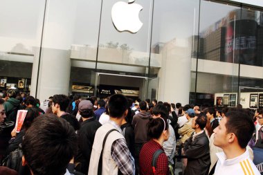 Crowds of buyers queue up to enter the Apple Store in the Joy City shopping mall to buy the iPhone 4 smartphones in the Xidan commercial district in Beijing, China, 25 September 2010 clipart
