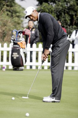US golfer Tiger Woods putts during the Pro-Am event of the HSBC Golf Champions 2010 in Shanghai, China, 3 November 2010. clipart
