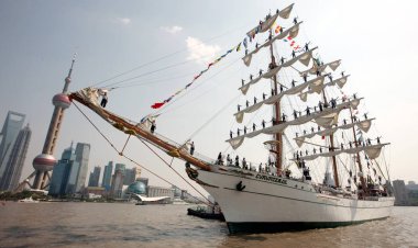 The sailing ship ARM Cuauhtemoc of the Mexican Navy is seen on the Huangpu River, with Oriental Pearl Tower, Jinmao Tower, World Financial Center and other skyscrapers in Lujiazui Financial District in the background, in Shanghai, China, Sunday, Apri clipart