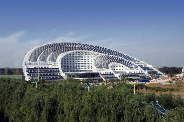 The Solar Valley Micro-E Hotel is seen equipped with many solar heat pipe collectors and solar panels in the Solar Valley, developed by Himin Group, the largest solar products manufactuer in China, in Dezhou city, east Chinas Shandong provinc clipart