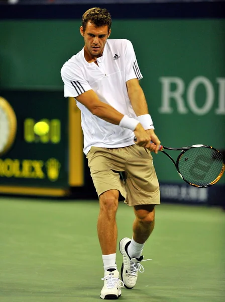 上海市に 2009 年上海 Atp マスターズ 1000 年テニス トーナメントの最初のラウンドでフランスのガエルモンフィルスと競うフランスの Paul Henry — ストック写真