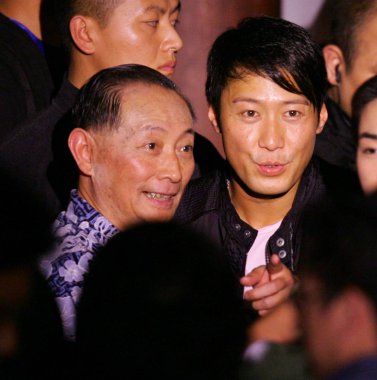 Hong Kong singer and actor Leon Lai, right, and Chinese Peking Opera star Mei Baojiu, son of Mei Lanfang, at a press conference marking the start of the production of new movie Mei Lan Fang, in Beijing 19 July 2007 clipart