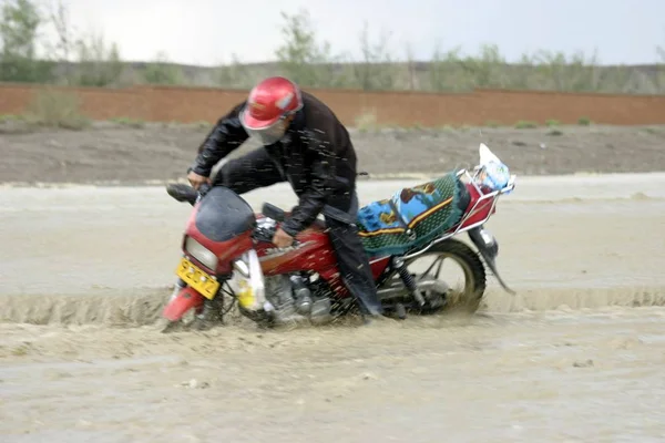 Motorcycle Driver Knocked Flood Heavy Rain Highway Hoboksar Mongol Autonomous — Stok fotoğraf