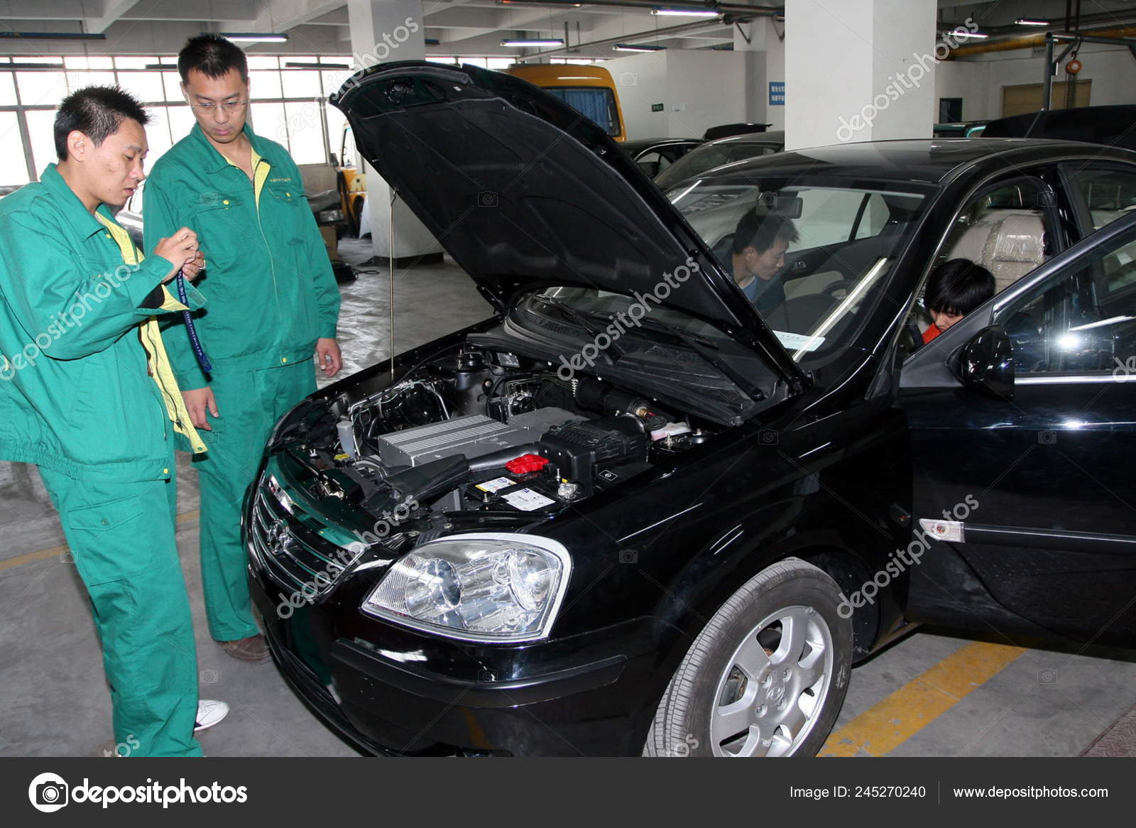 Chinese Workers Test Electric Car Tianjin Qingyuan Electric Vehicle Ltd