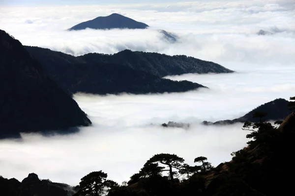 View of the cloud sea of the Yellow Mountain (Mount Huangshan or Huang Mountain) in east Chinas Anhui province, November 14, 2009