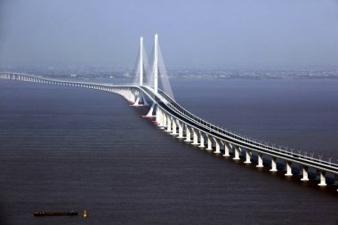 Aerial view of the Shanghai Yangtze River Bridge which links Chongming and Changxing Islands in Shanghai, China, 23 October 2009 clipart