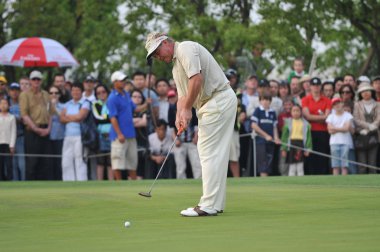 Darren Clarke of Northern Ireland tees off during the BMW Asian Open 2008 golf tournament, at the Tomson Shanghai Pudong Golf Club in Shanghai, April 27, 2008. Clarke won the tournament with the score of 8 under.  clipart
