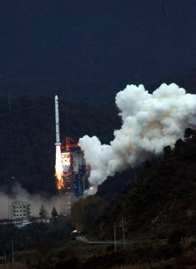 A Long March rocket CZ-3A carrying ChangE-I lunar orbit satellite blasts off at Xichang Satellite Launch Center in southwest Chinas Sichuan province 24 October 2007 clipart