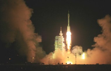 A Long March 2F (CZ-2F) space rocket carrying the Shenzhou VII manned spacecraft and three Chinese taikonauts (astronauts) blasts off at Jiuquan Satellite Launch Center in northwest Chinas Gansu province, Thursday, 25 September 2008. clipart