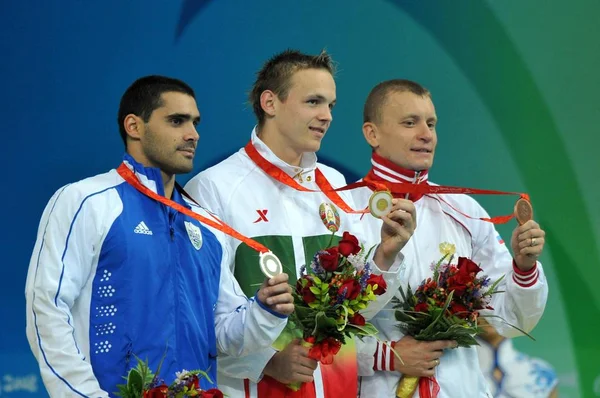 Fra Venstre Sølvmedaljevinder Jim Anderson Storbritannien Guldmedaljevinder Dmitry Kokarev Rusland - Stock-foto