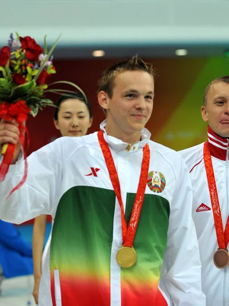 Guldmedaljevinder Dmitry Kokarev Rusland Venstre Bronze Medaljevinder Georgios Kapellakis Grækenland - Stock-foto