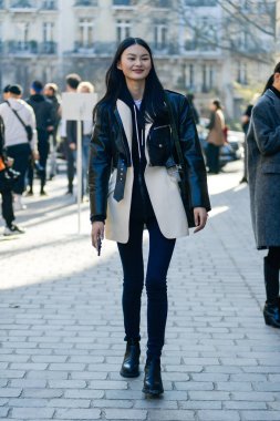 Chinese model He Cong is pictured in Paris during the Paris Fashion Week Fall Winter 19/20 in France, 27 February 2019. clipart