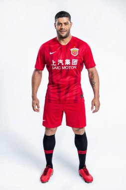 Brazilian football player Givanildo Vieira de Sousa, known as Hulk, of Shanghai SIPG F.C. poses during the filming session of official portraits for the 2019 Chinese Football Association Super League in Shanghai, China, 25 February 2019. clipart