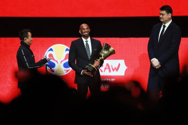 Former NBA basketball player and FIBA World Cup Ambassador Kobe Bryant, center, Retired Chinese basketball star Yao Ming, tallest, chairman of the Chinese Basketball Association attend the draw ceremony for the 2019 FIBA Basketball World Cup in Shenz