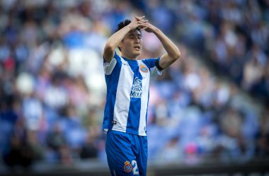 Wu Lei of RCD Espanyol reacts during their 28th round match of the La Liga 2018-2019 season against Sevilla FC  at RCDE Stadium in Barcelona, Spain, 17 March 2019. clipart