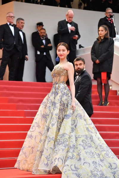 stock image Chinese actress Guan Xiaotong poses as she arrives on the red carpet for the 72nd Cannes International Film Festival in Cannes, France, 17 May 2019.